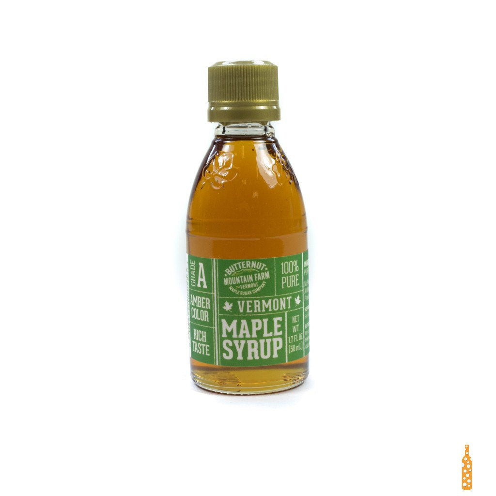 Amber Vermont maple syrup glass bottle with gold cap, side label shown