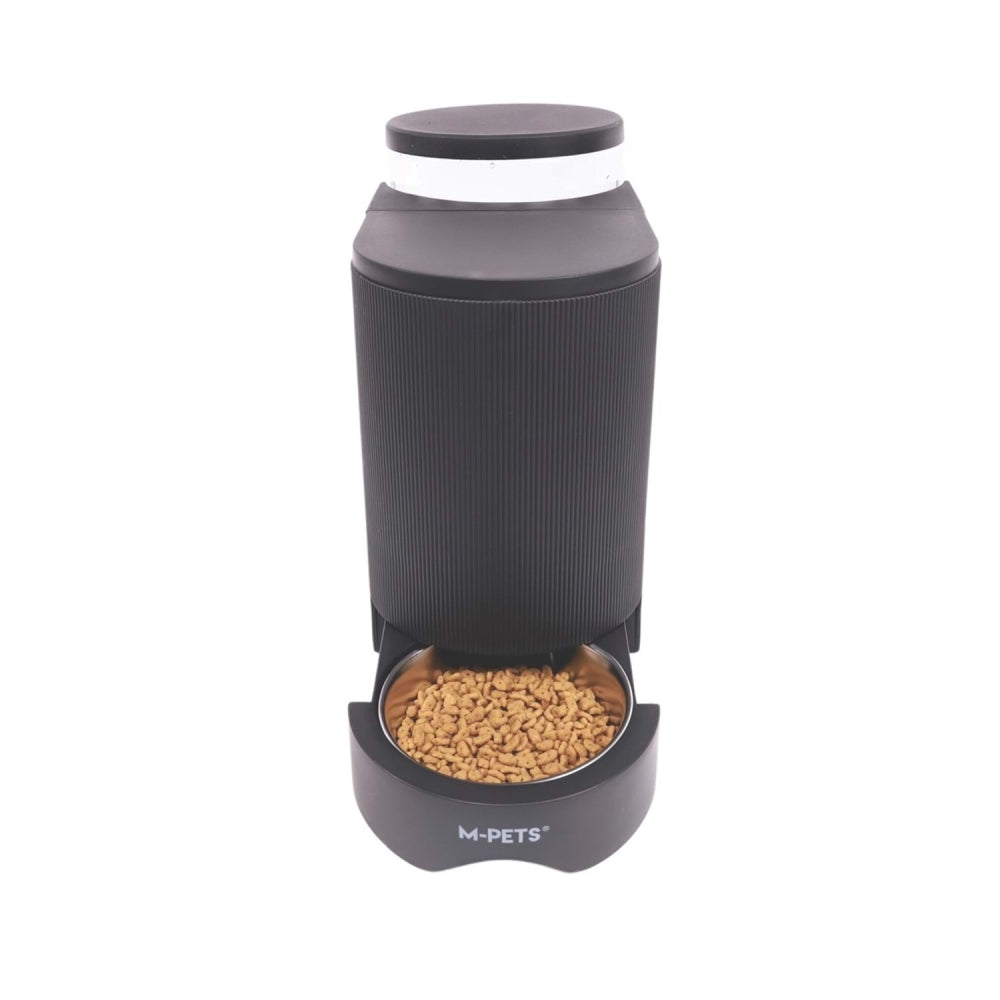 Black dual dispenser with top reservoir and bottom food bowl filled with kibble
