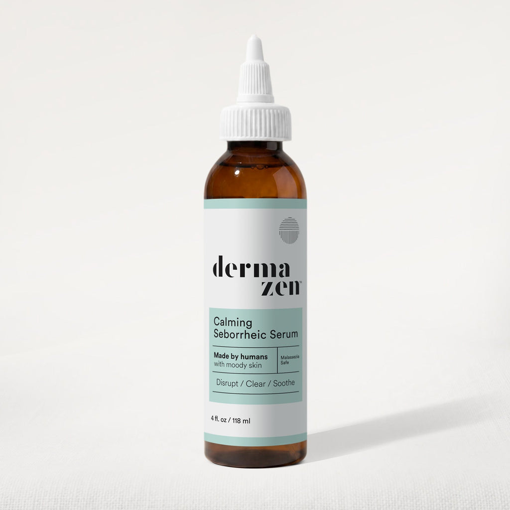 Amber scalp serum bottle with dropper, white label reading Calming Seborrheic Serum