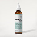 Amber scalp serum bottle with dropper, white label reading Calming Seborrheic Serum