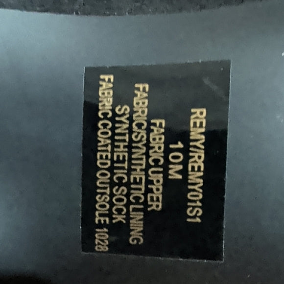 Steve Madden label on boot insole with size and fabric care text