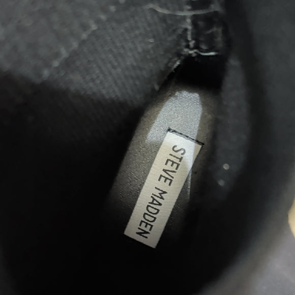 Steve Madden interior label on black sock boot lining