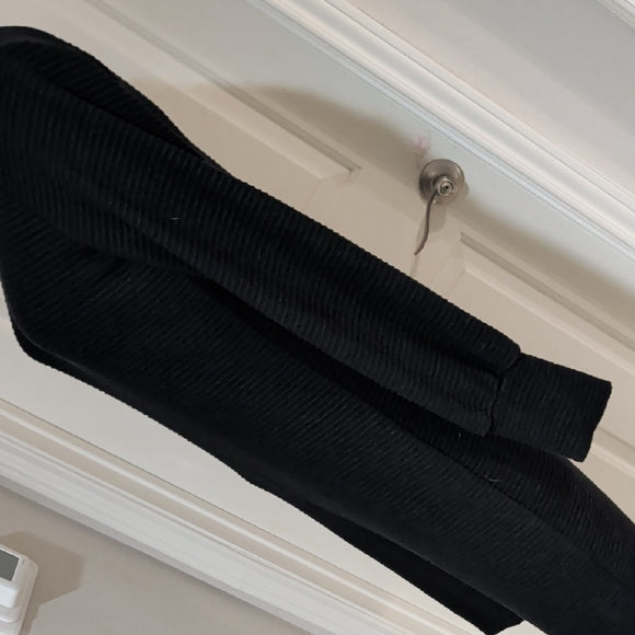 Black long-sleeve ribbed cuffs with stitched seam detail