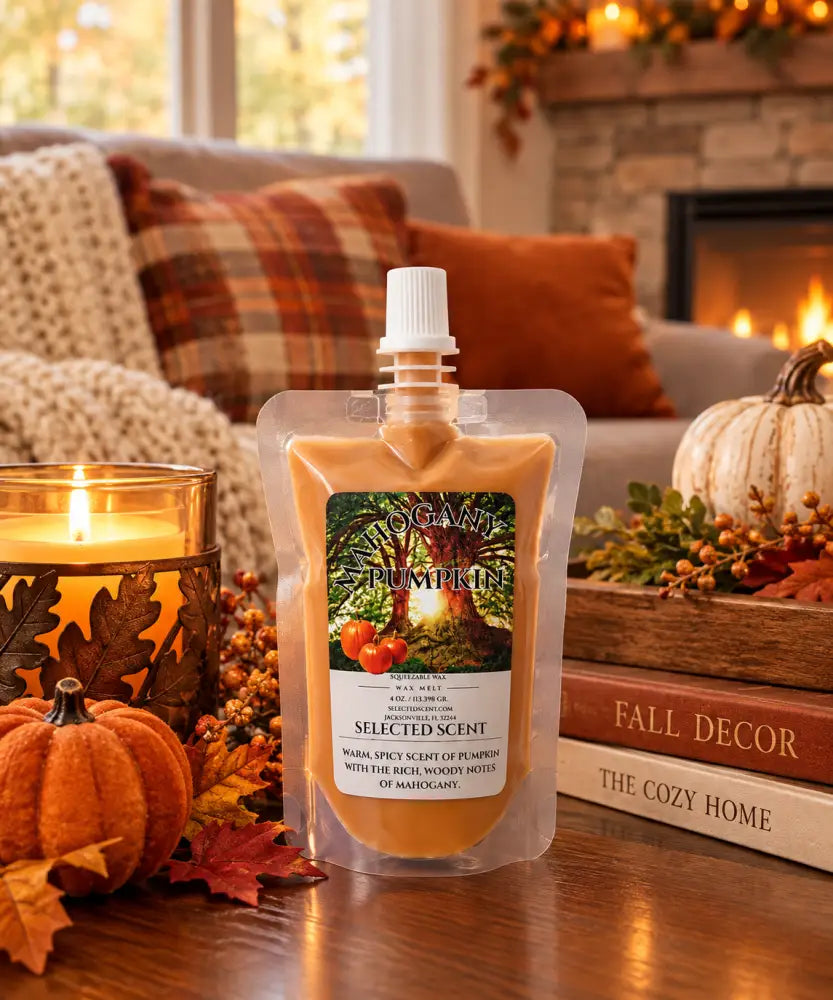 Squeezable wax melt pouch with Mahogany Pumpkin label, peach-orange wax, pump cap