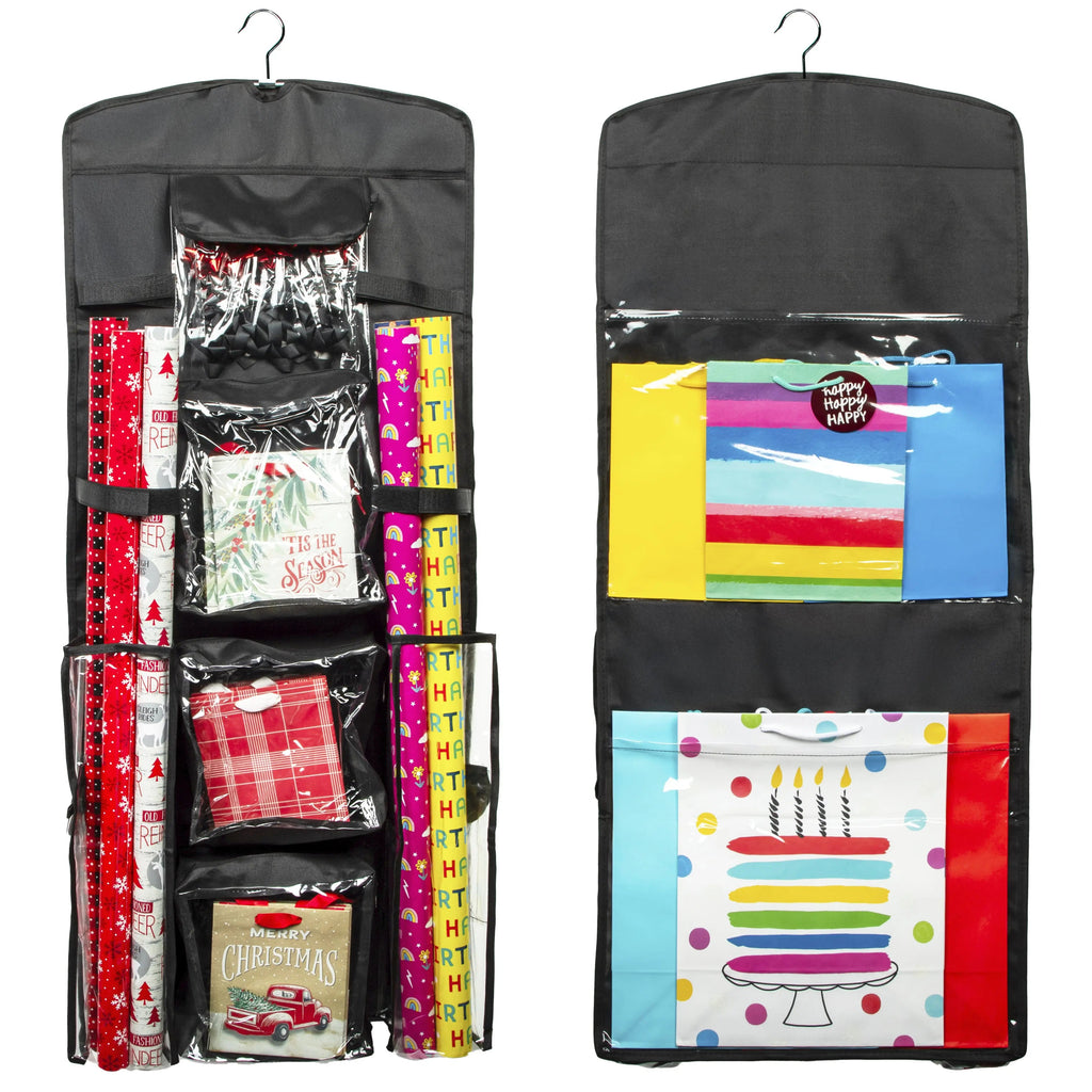 Black hanging gift wrap storage organizer with clear pockets holding wrapping paper and bags