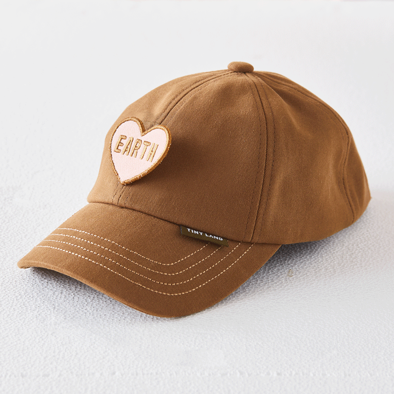 Brown kids play kitchen cap with stitched patch and curved brim.