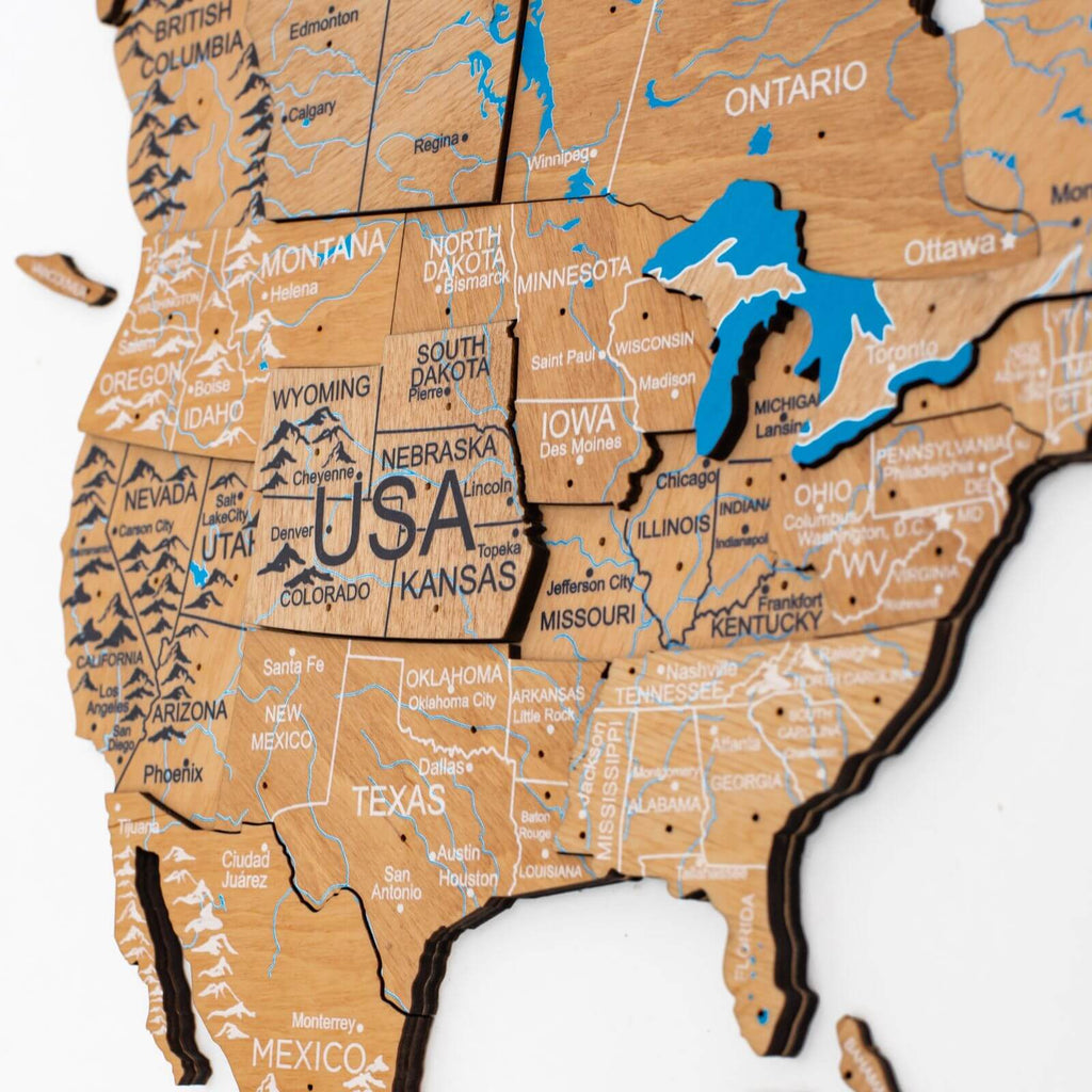 Wooden USA wall map with engraved state names and blue water region features