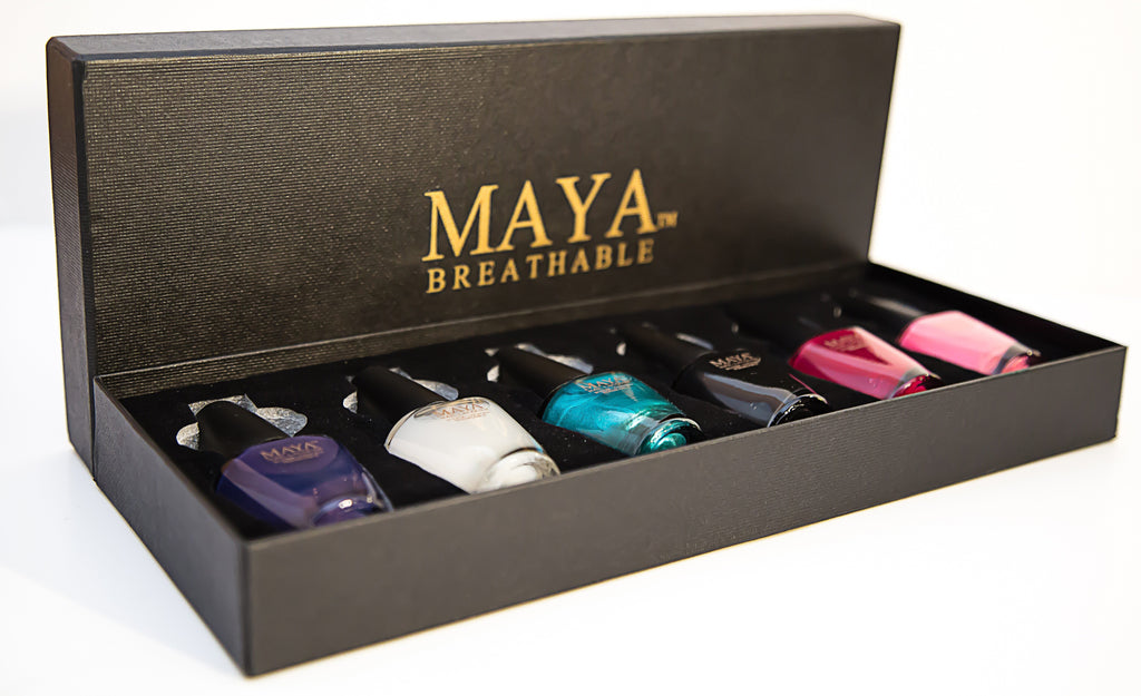 6-piece nail polish gift set in open black box with six assorted color bottles