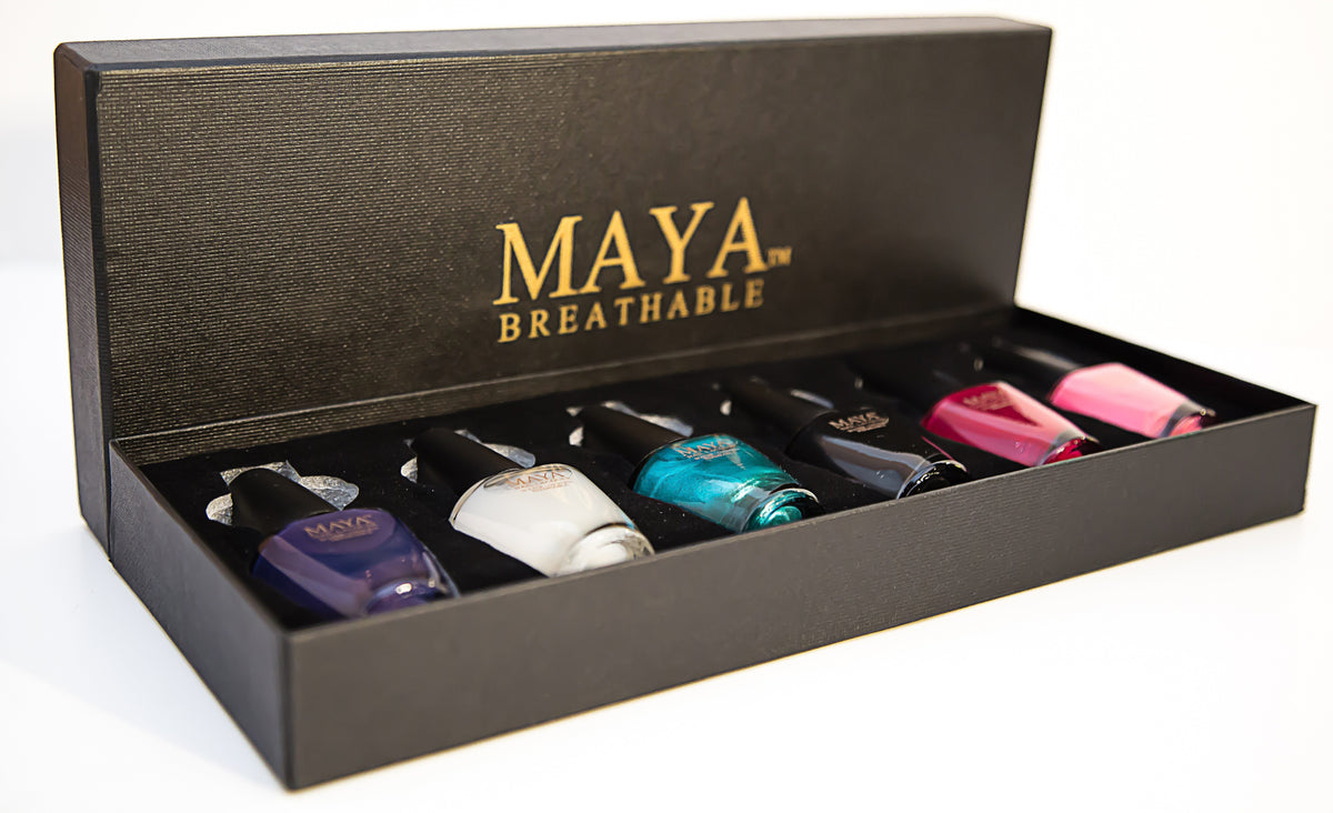 6-piece nail polish gift set in open black box with six assorted color bottles