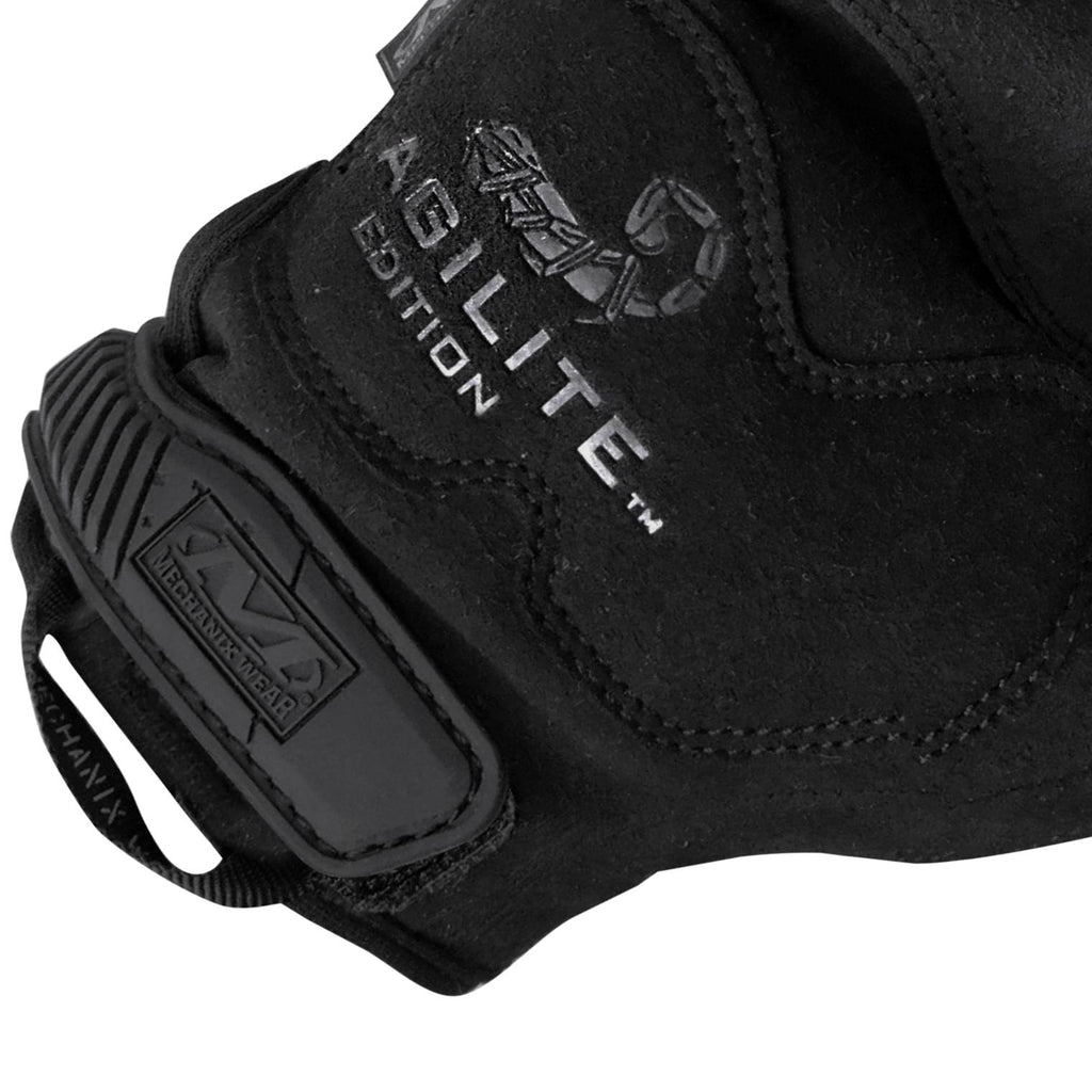 Black tactical glove with Mechanix logo patch and stitched palm panel
