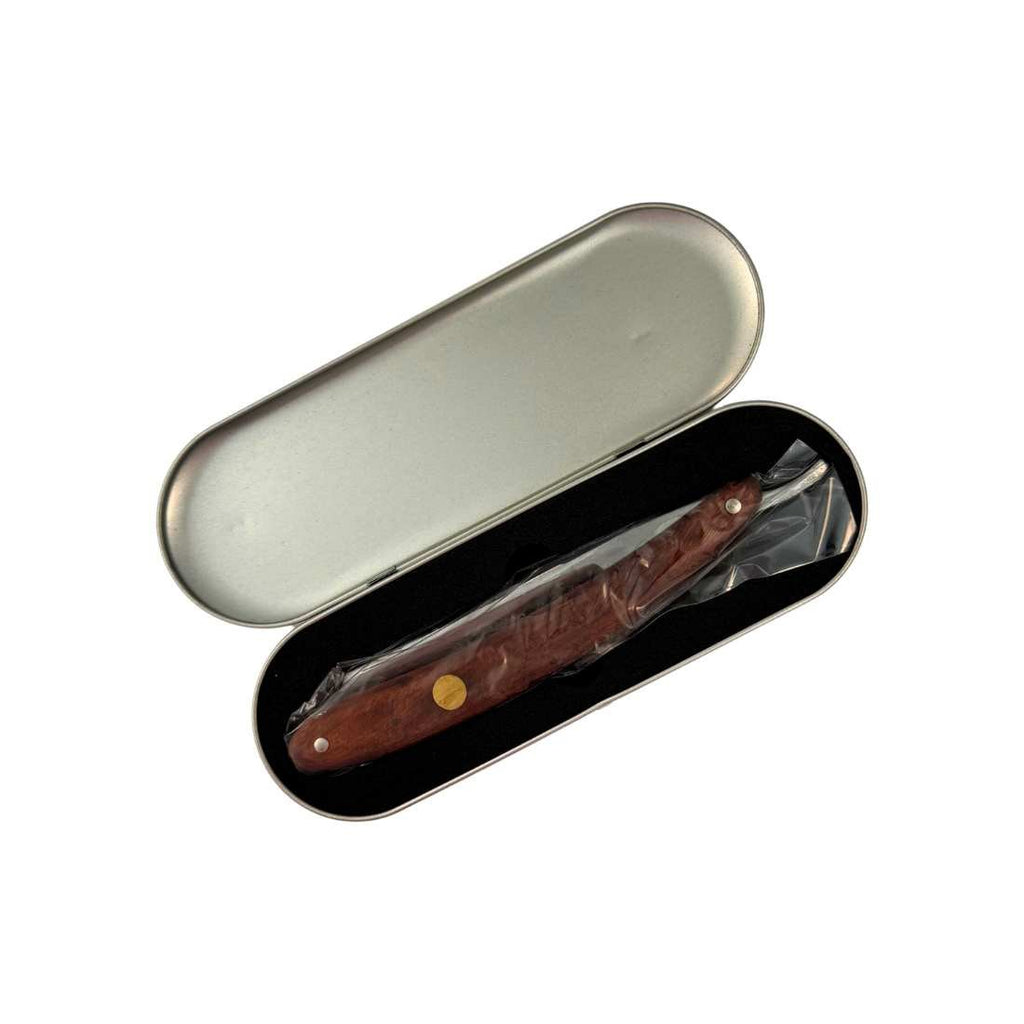 Straight razor case holding a dark wood handled blade in a clear sleeve