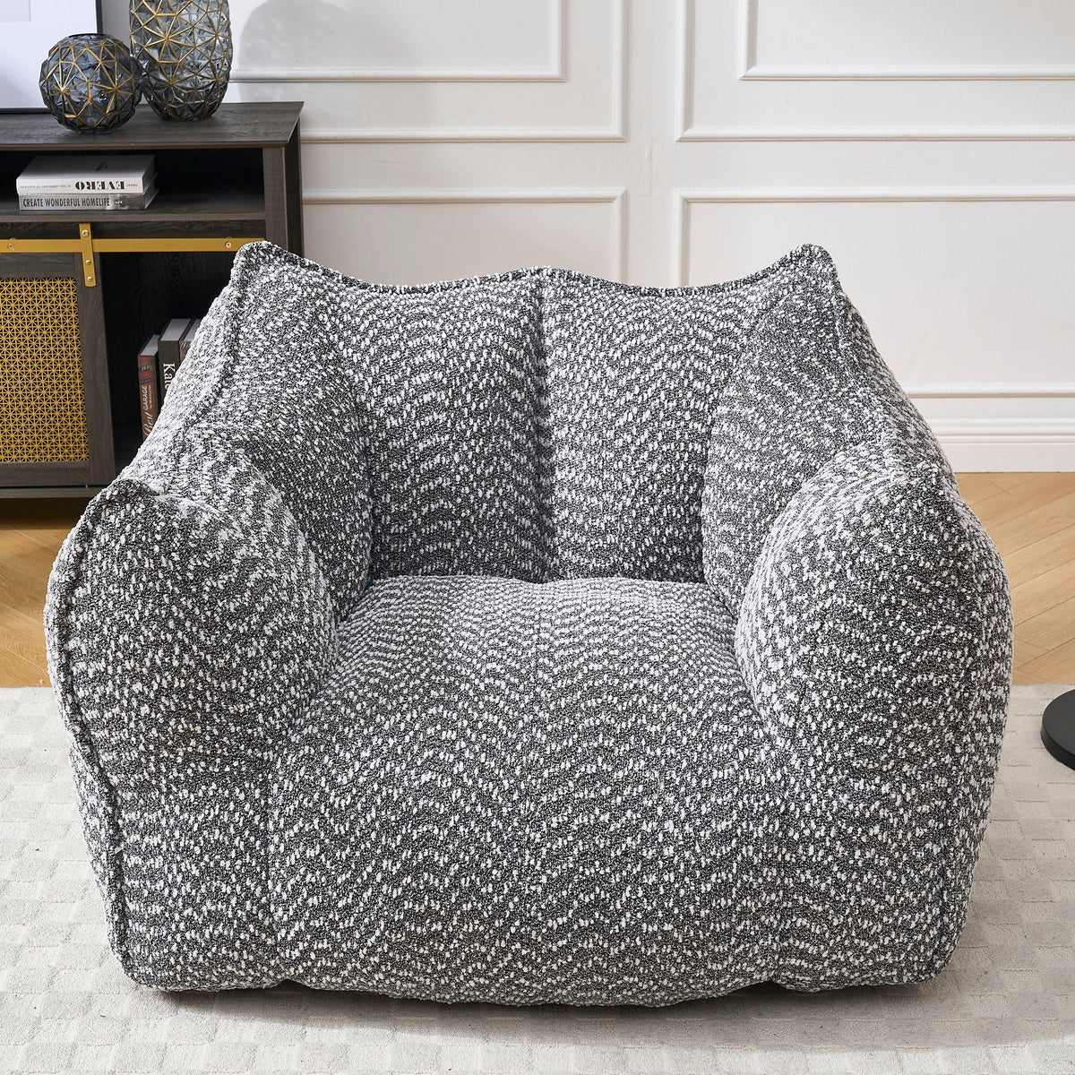 Dark gray chenille arm chair with thick padded arms and backrest