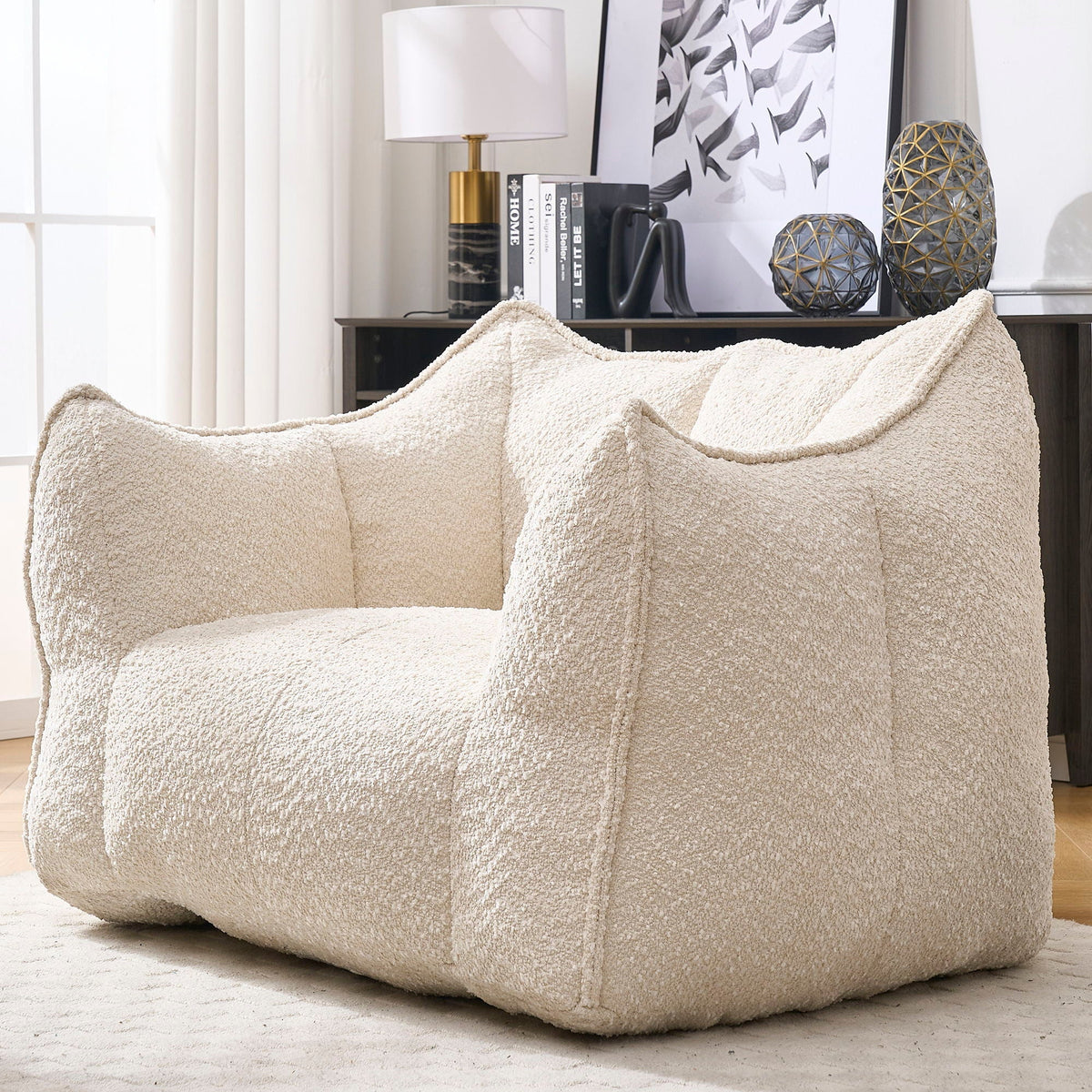 Cream chenille arm chair with deep seat, rounded arms, and cushioned back