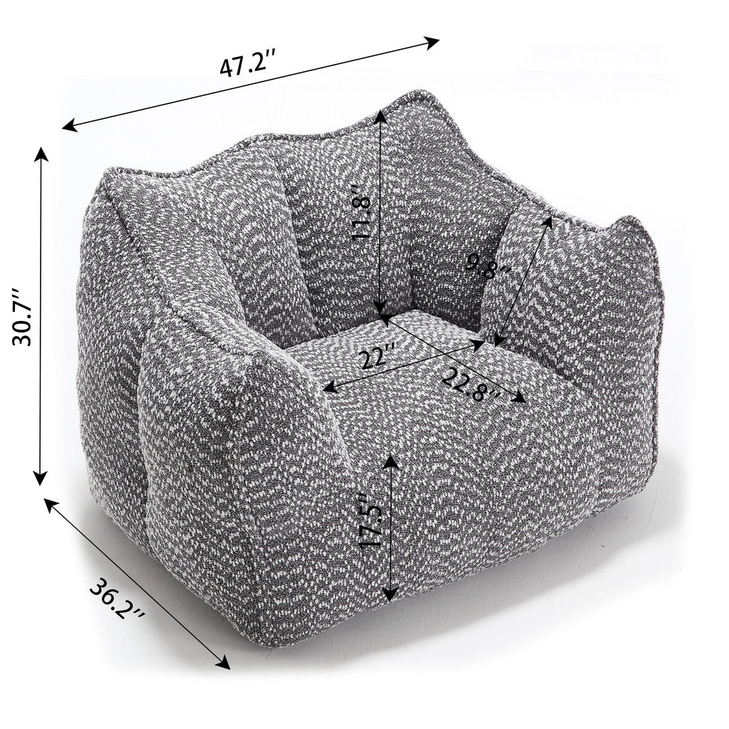 Chenille arm chair in dark gray with rounded arms and cushioned seat, front view