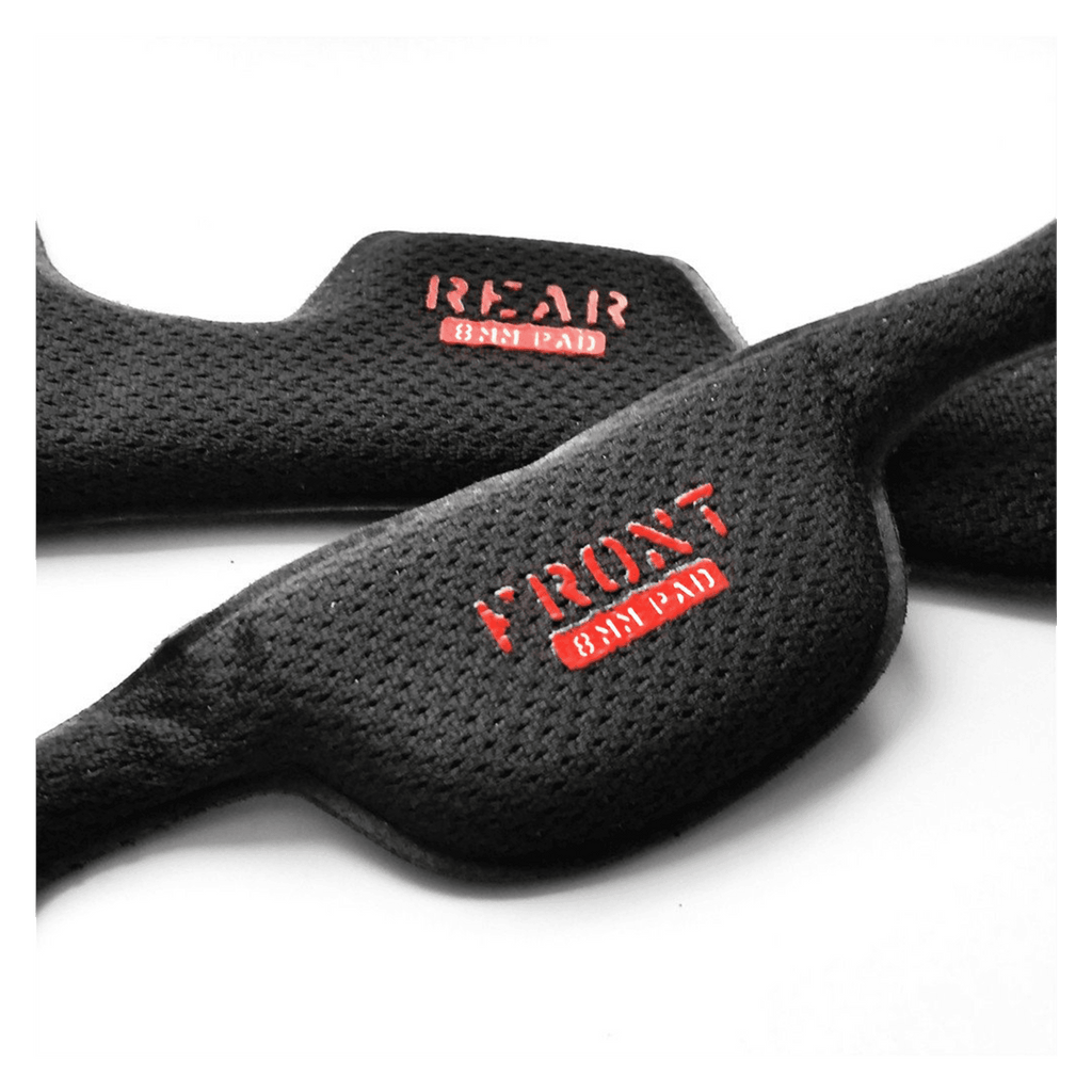 Black helmet strap pads with red printed text and textured fabric