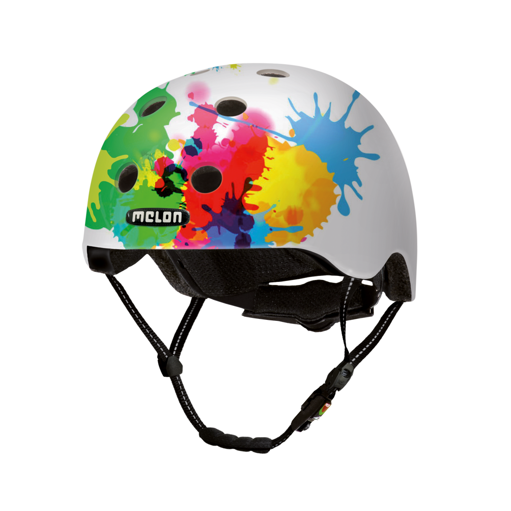White bike helmet with colorful splatter graphic and black chin strap