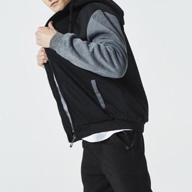 Men’s black zip-up hoodie jacket with gray hood lining and long sleeves