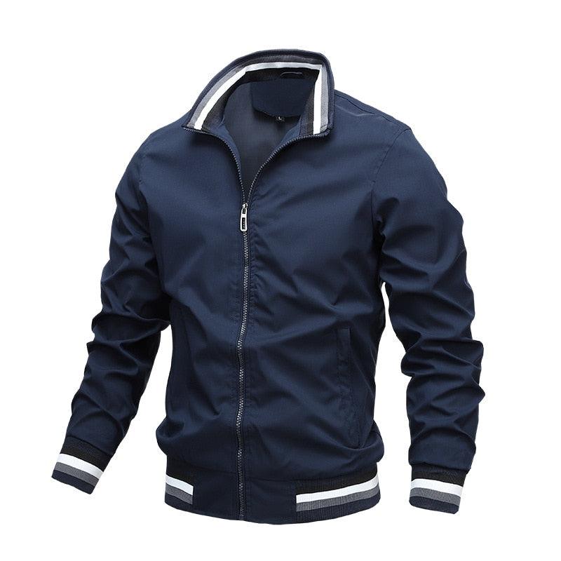 Men's lightweight windbreaker jacket, navy blue, front view with ribbed striped cuffs