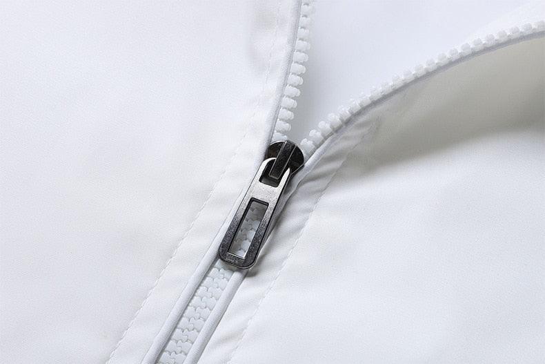Men’s white jacket detail, black zipper pull on zip front with stitched seam