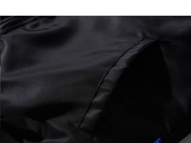 Black jacket stitched seam detail with pocket opening panel