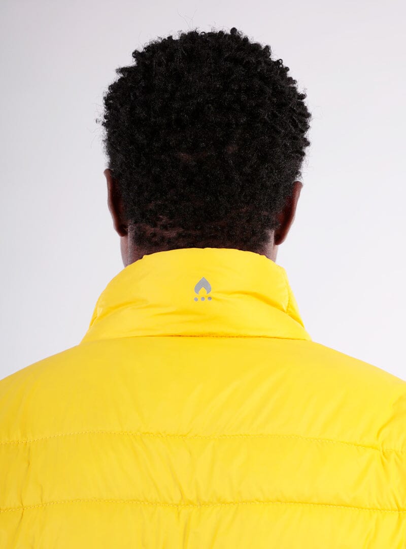 Back view of yellow puffer jacket with hood and quilted horizontal insulation baffles.
