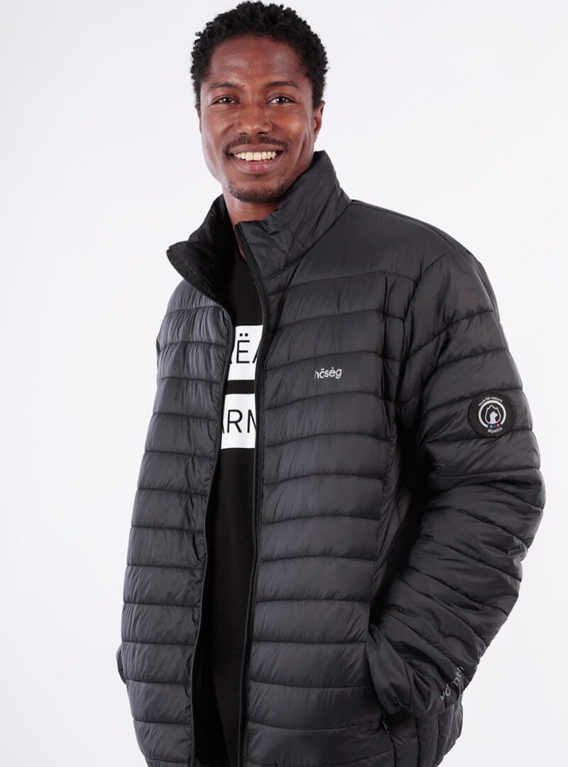 Black hooded puffer jacket with full-zip front and sleeve logo patch
