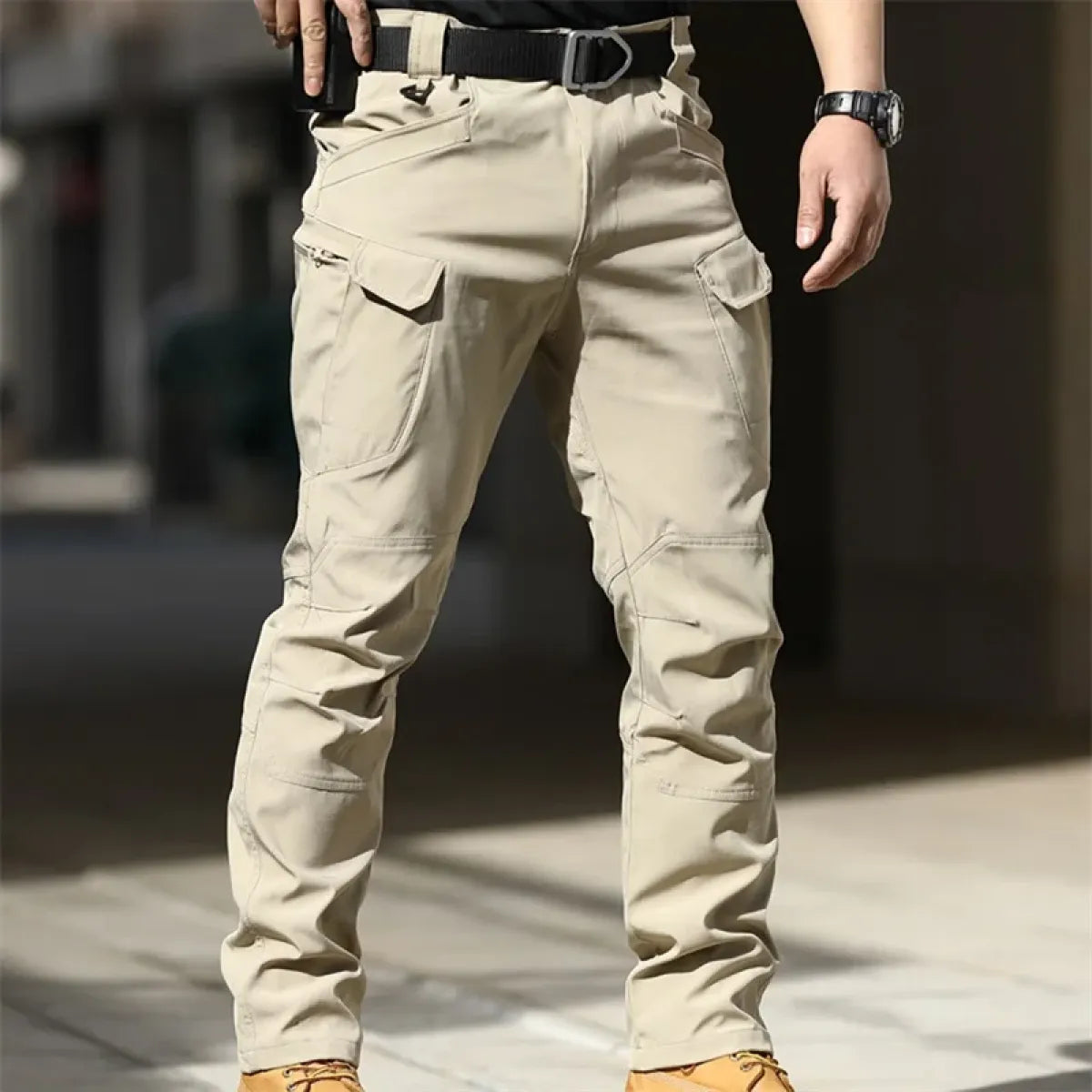 Light beige men's cargo pants with cargo flap pockets and belt loops