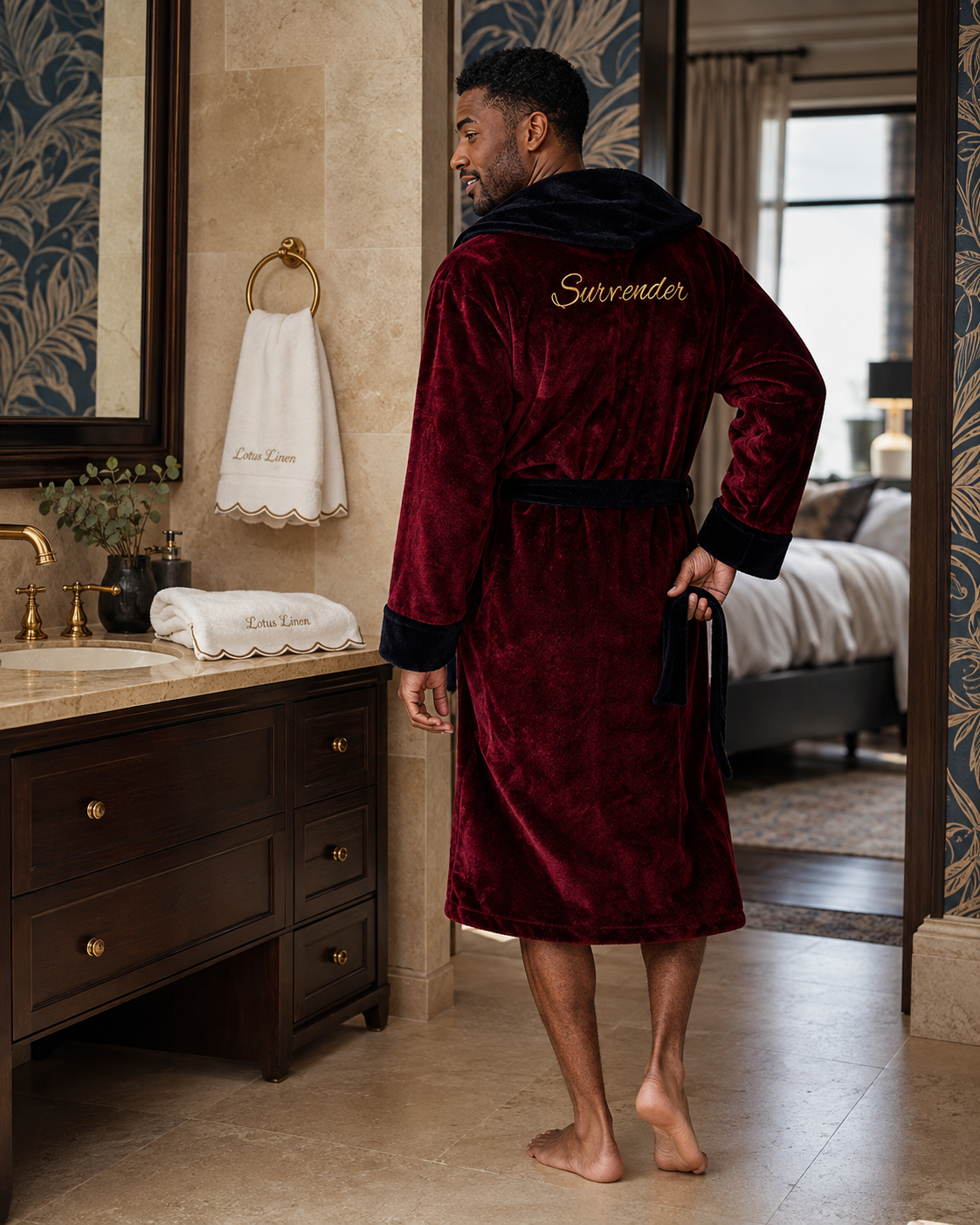 Men’s hooded plush robe in burgundy with dark trim, belt tie at waist.
