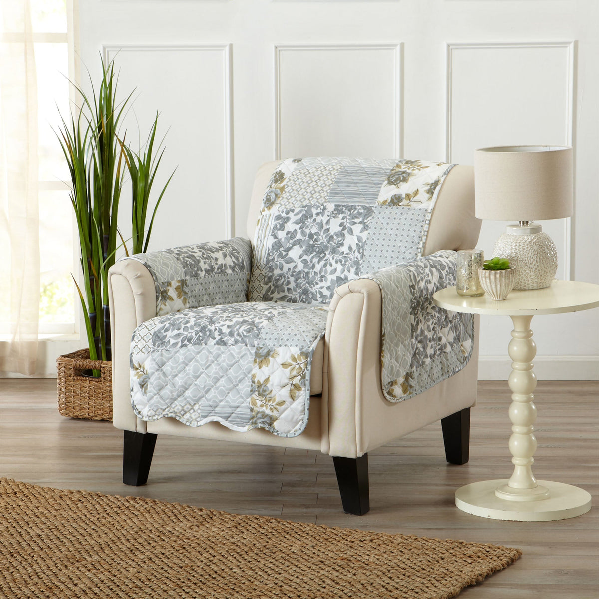 Reversible sofa protector set on armchair sofa, patchwork quilted cover with floral print