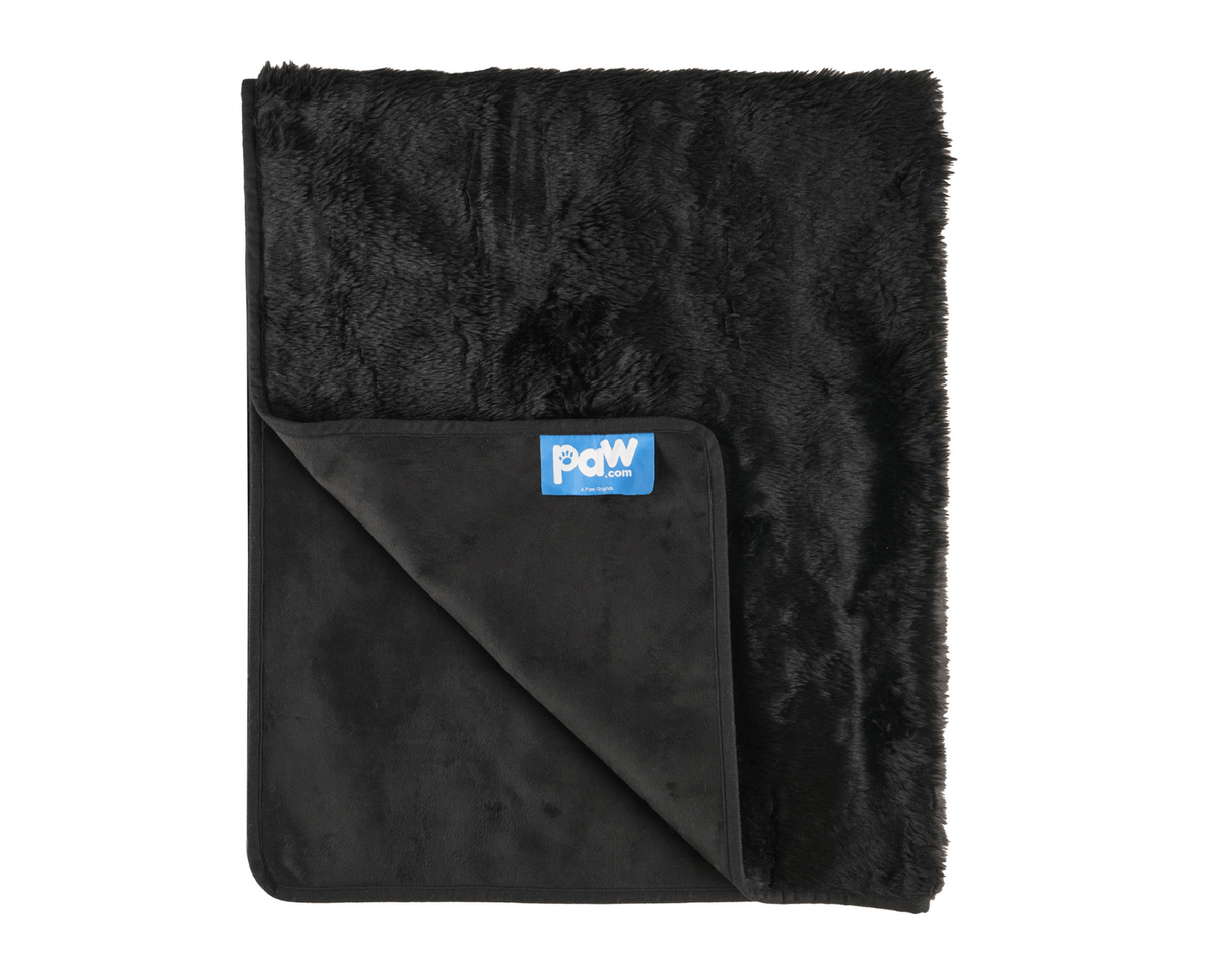 Midnight black faux-fur throw blanket with inner waterproof layer and logo label.