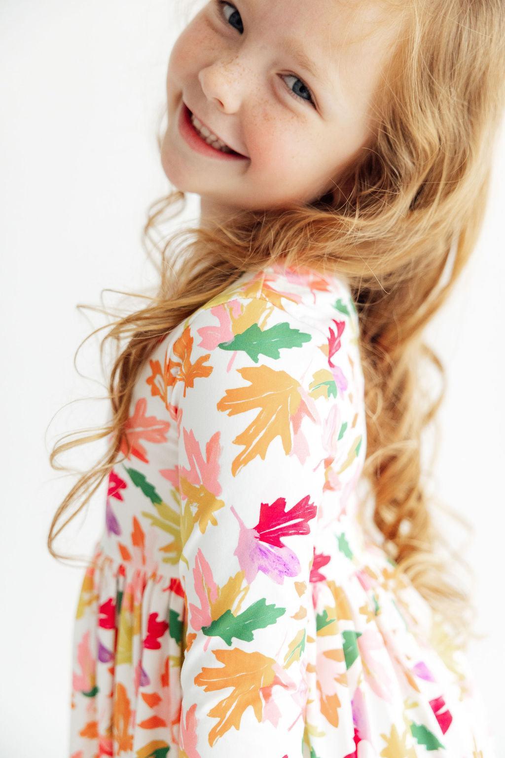 Girls' multicolor leaf-print 3/4 sleeve twirl dress with gathered bodice