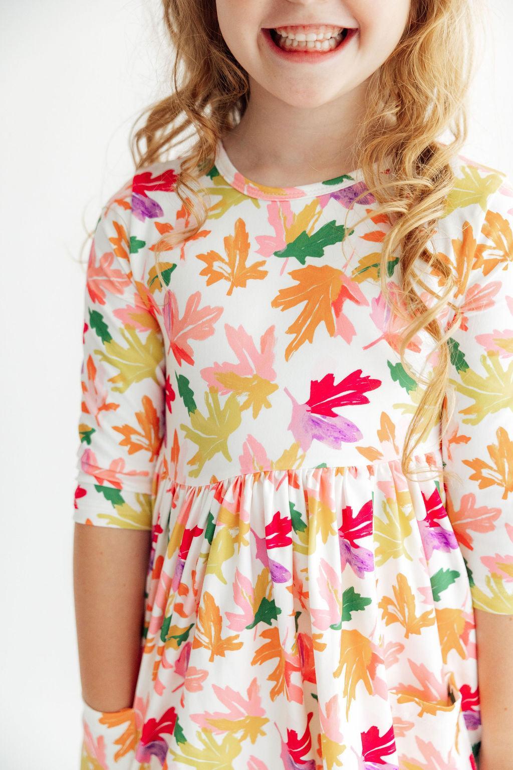 Girls' multicolor leaf-print 3/4 sleeve twirl dress detail, gathered waist