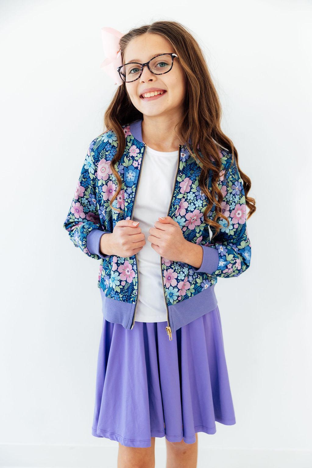 Floral satin zip jacket with purple ribbed hem and cuffs, blue and pink floral pattern