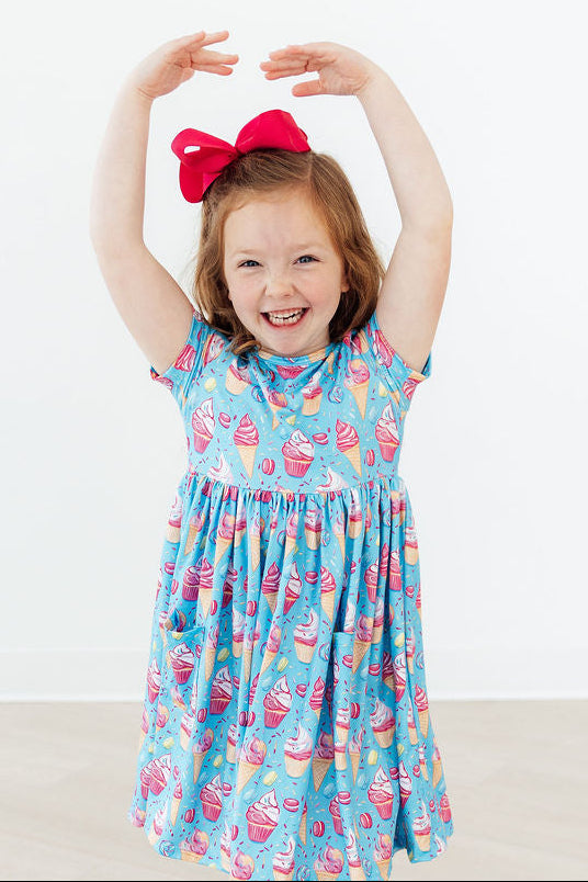 Light blue dessert-print short-sleeve twirl dress with gathered bodice