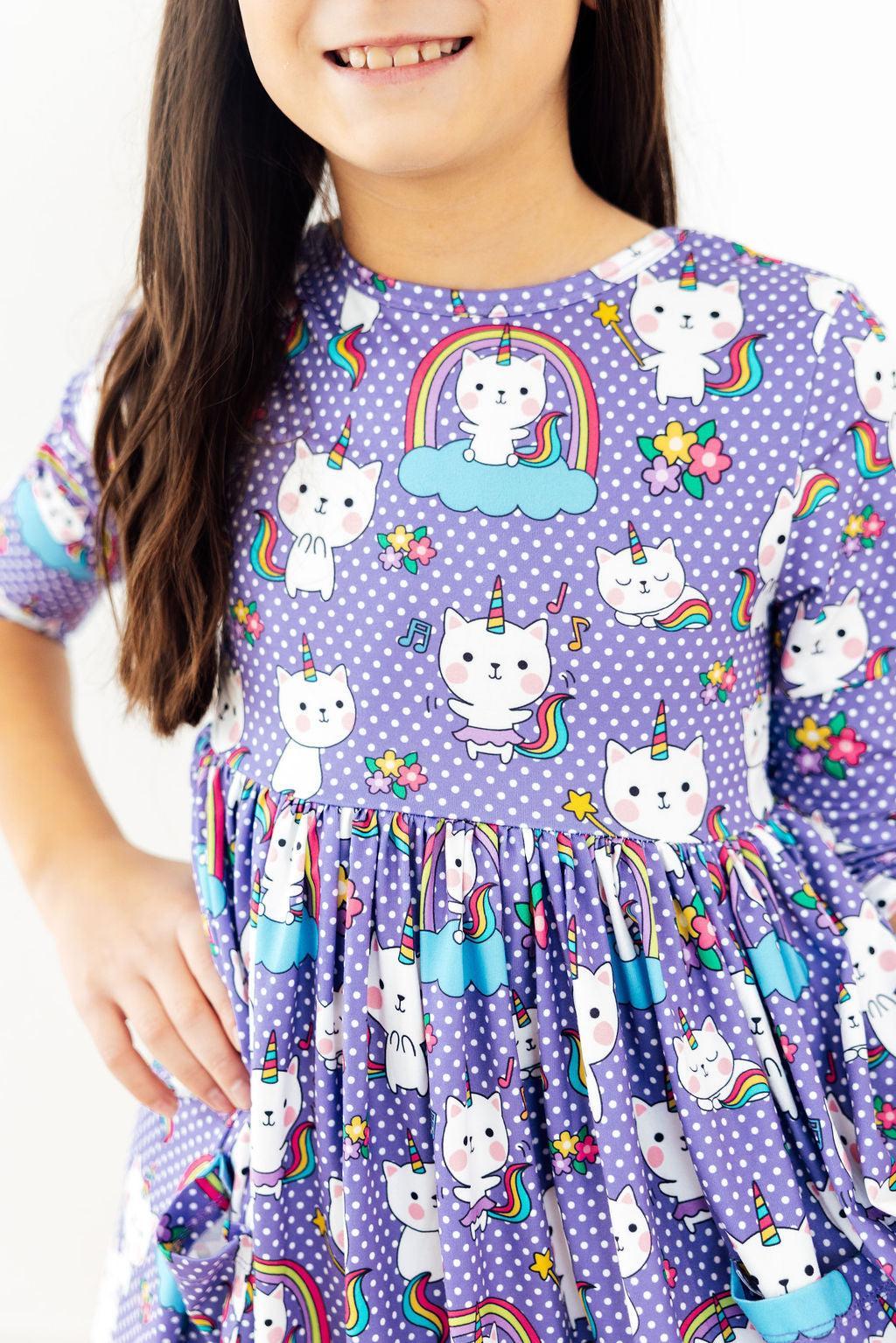 Girls purple 3/4 sleeve twirl dress with cat and rainbow unicorn print, pockets