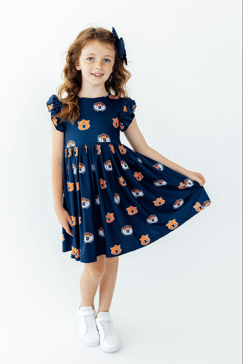 Aubie flutter twirl dress front view with cap sleeves and logo-print twirl skirt