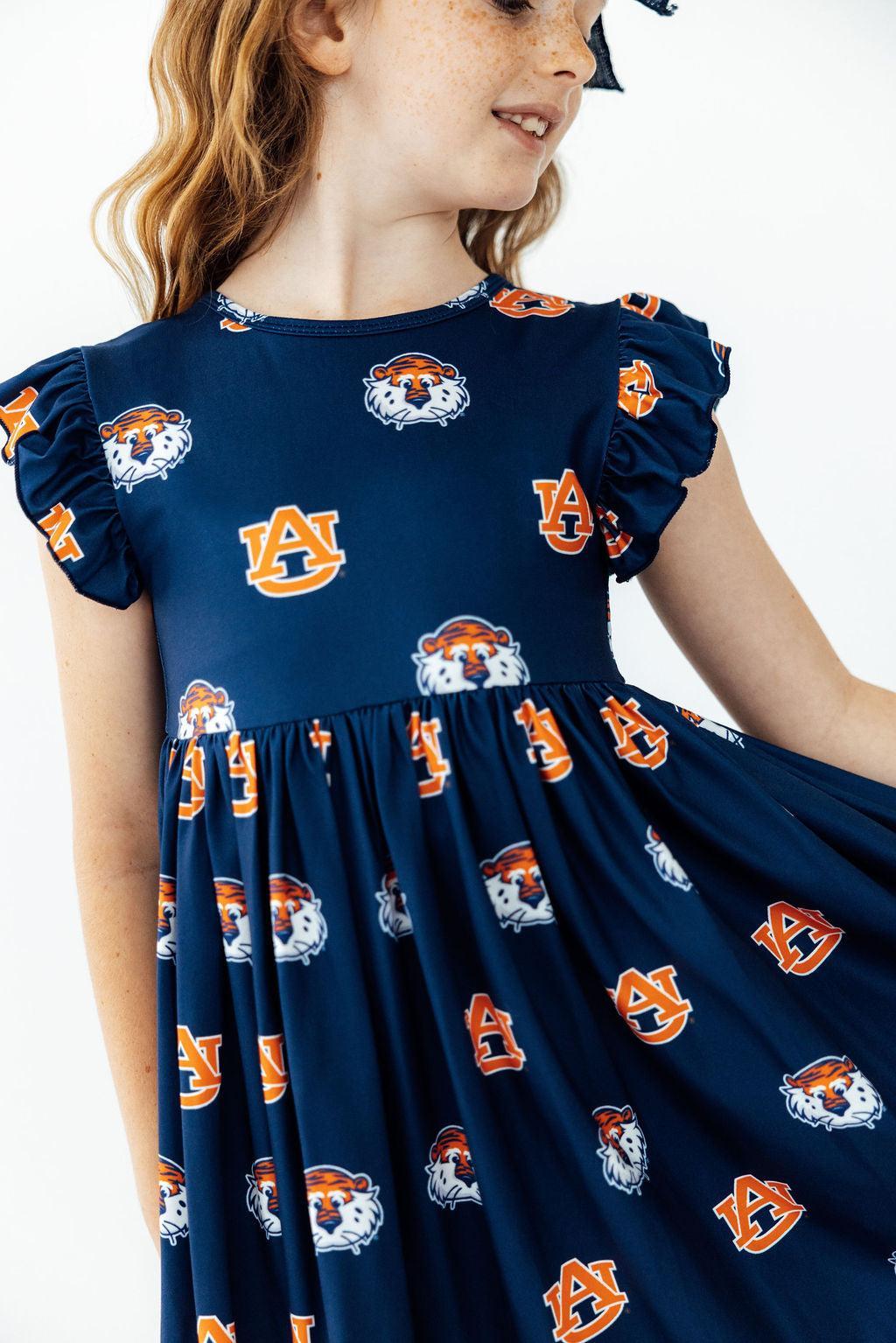Aubie flutter twirl dress bodice with cap flutter sleeves and Auburn logo pattern