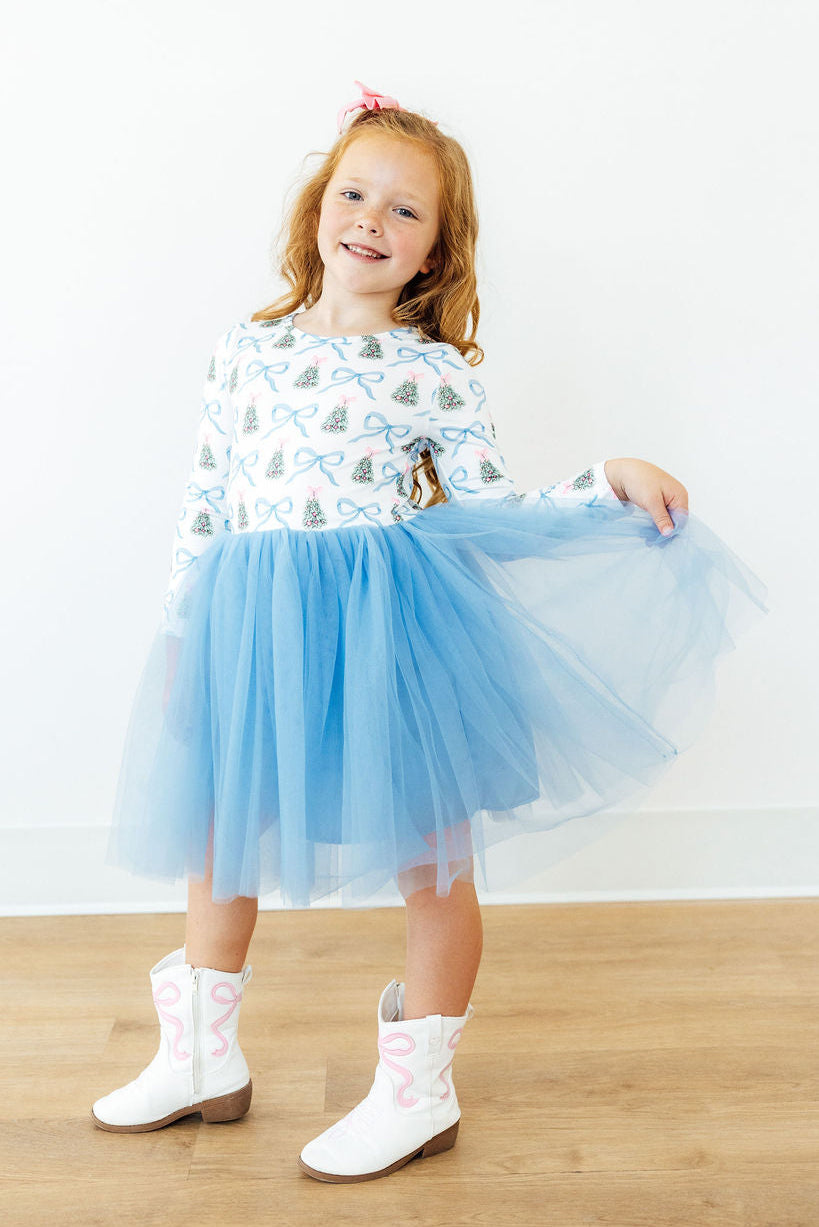 Light blue tulle tutu dress with long sleeves and white bow-and-tree print bodice, flared skirt
