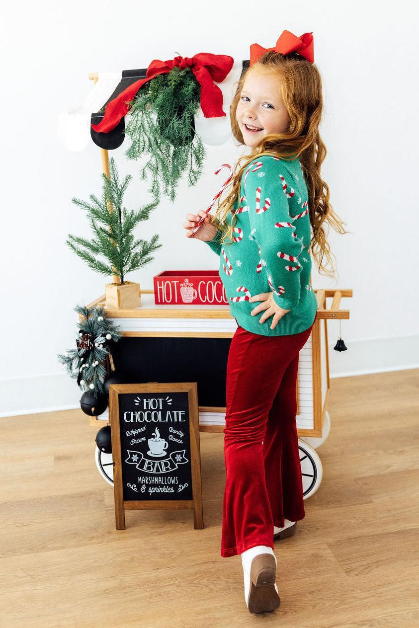 Kids teal Christmas candy cane sweater with long sleeves and crew neckline