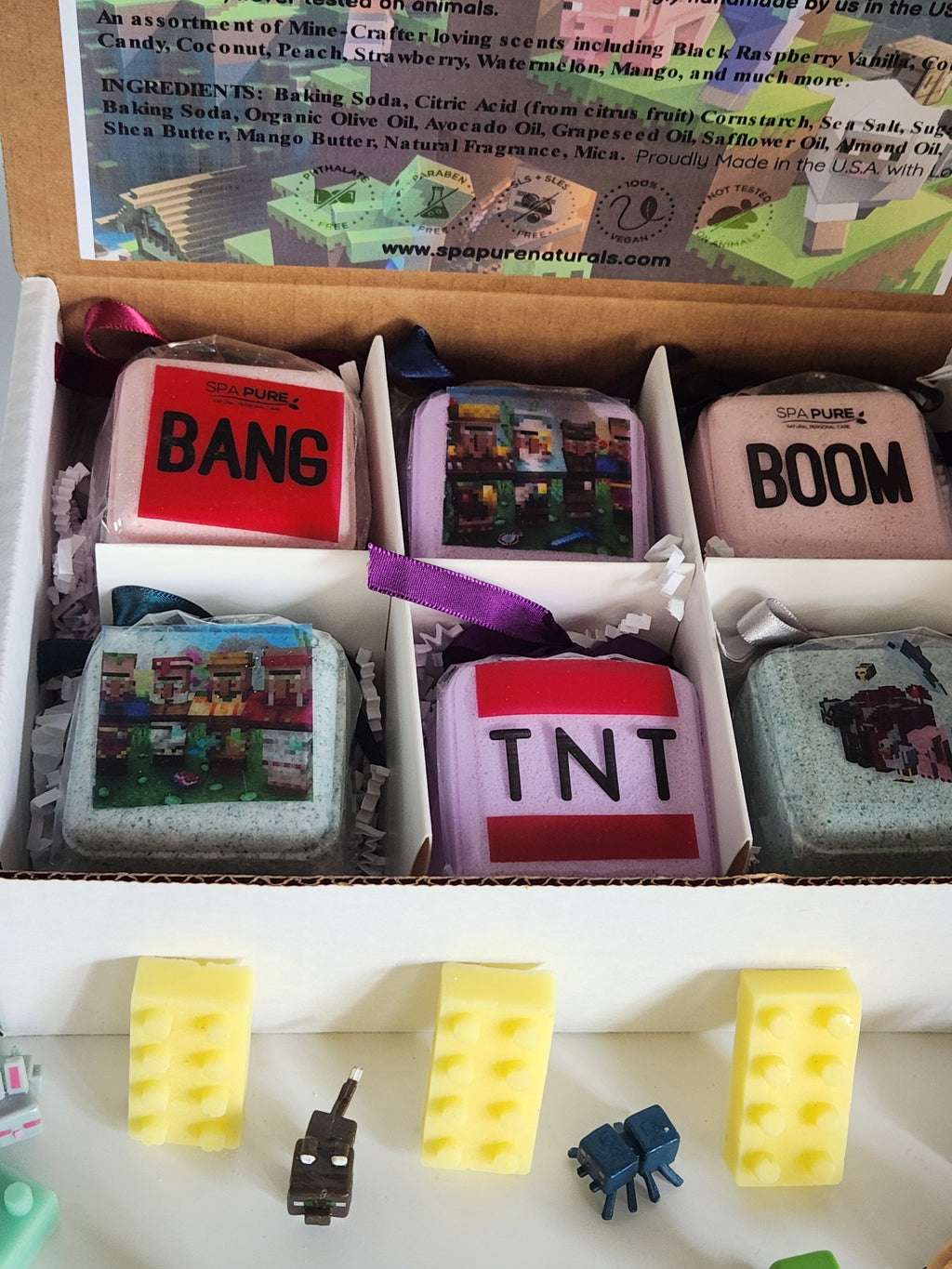 Kid bath bomb assortment box with BANG, BOOM, TNT bars and yellow block-shaped bombs