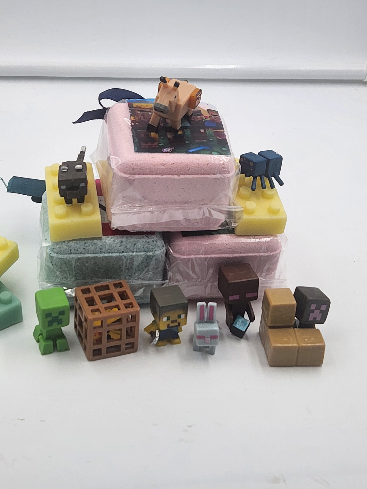 Bath bomb gift set showing stacked colored bars and Minecraft-style block toys