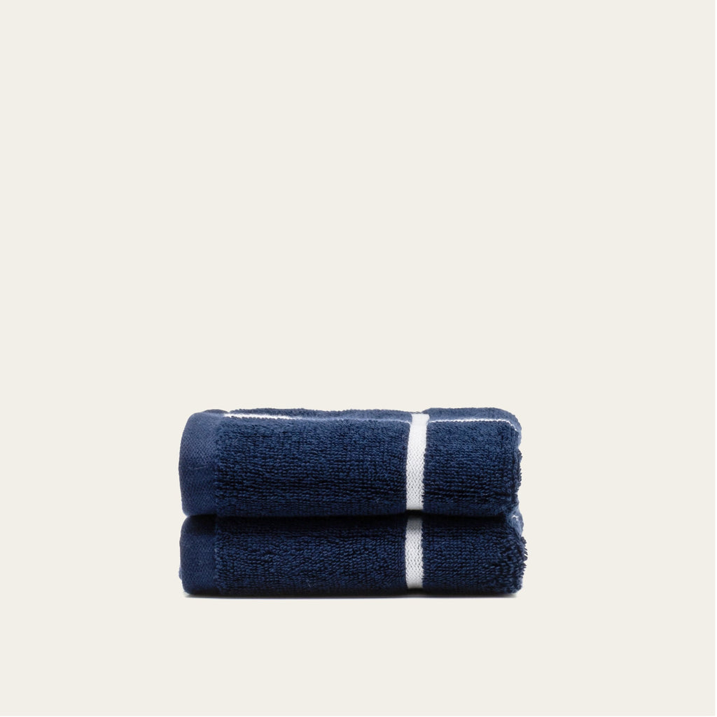 Navy and white striped cotton towels, folded pair with center stripe
