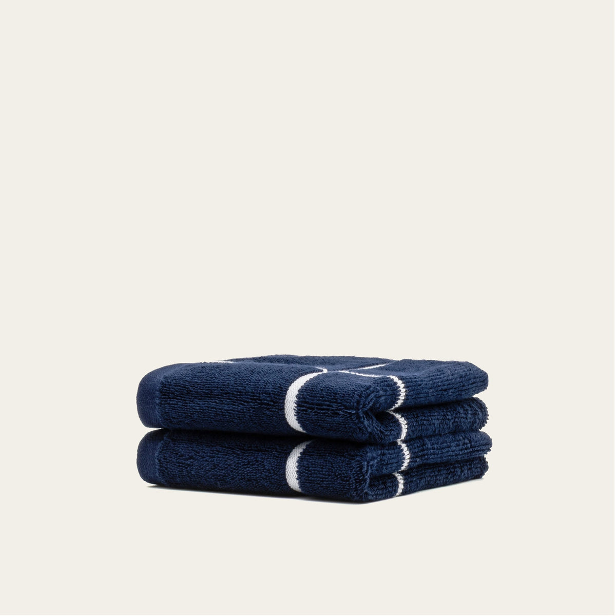 Navy and white striped cotton towels, rolled stack of two
