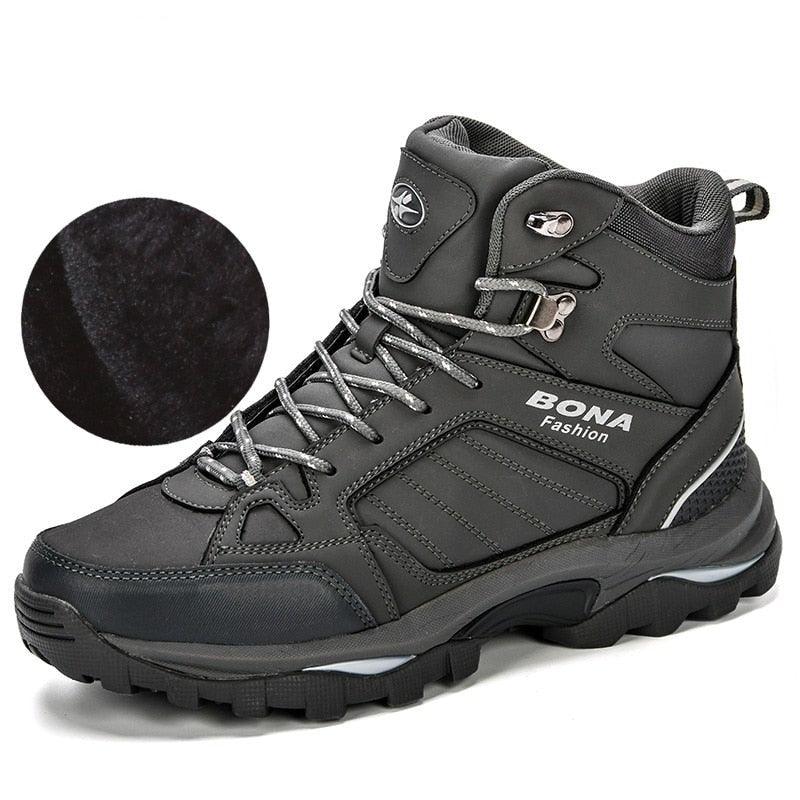 Men’s lace-up winter boots with padded collar, dark gray leather-look upper and tread sole