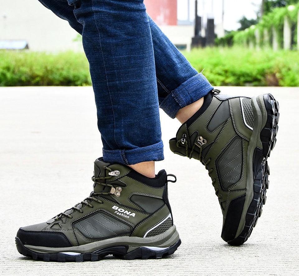 Men's dark green hiking boots with lace-up front and thick tread sole