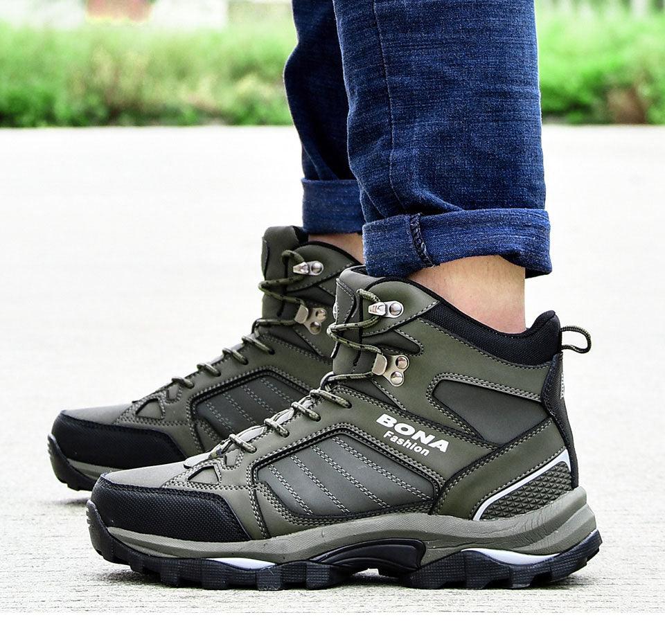 Men’s olive-green lace-up winter boots with padded collar and thick rubber tread sole