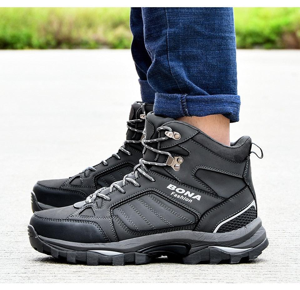Men's black high-top hiking boots with lace-up closure and textured side panels