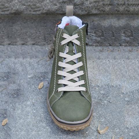 Green lace-up high-top ankle boot with plush collar lining and chunky textured outsole