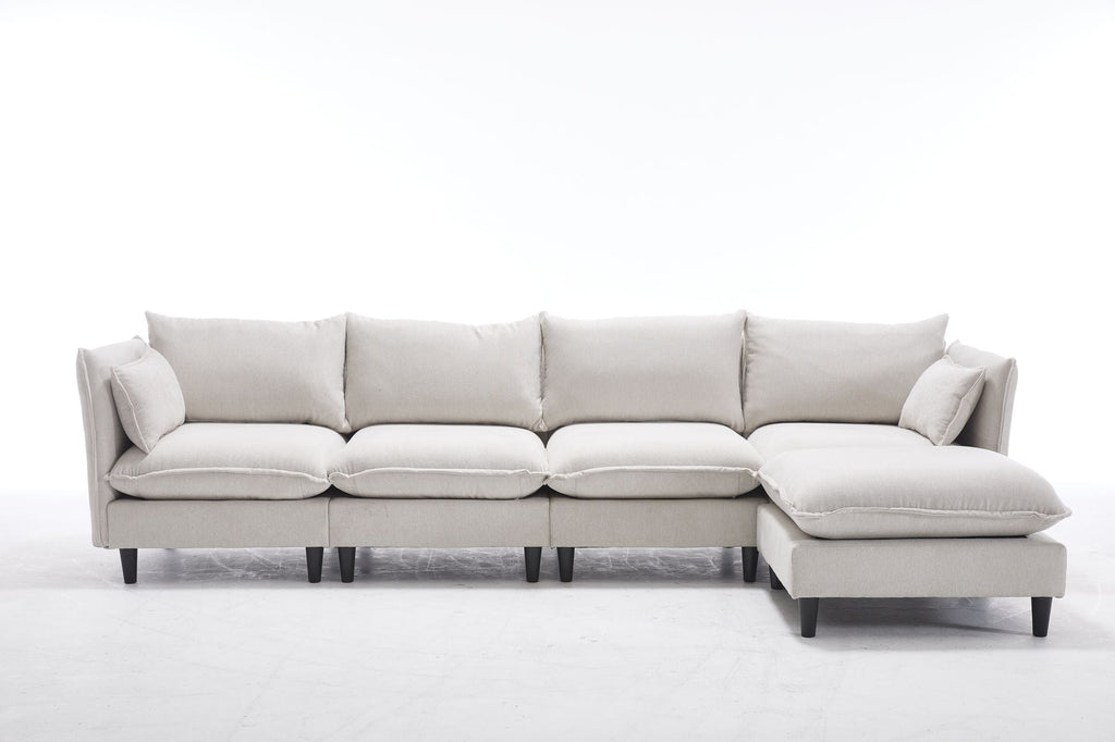 Beige sectional sofa with chaise ottoman and four seat cushions