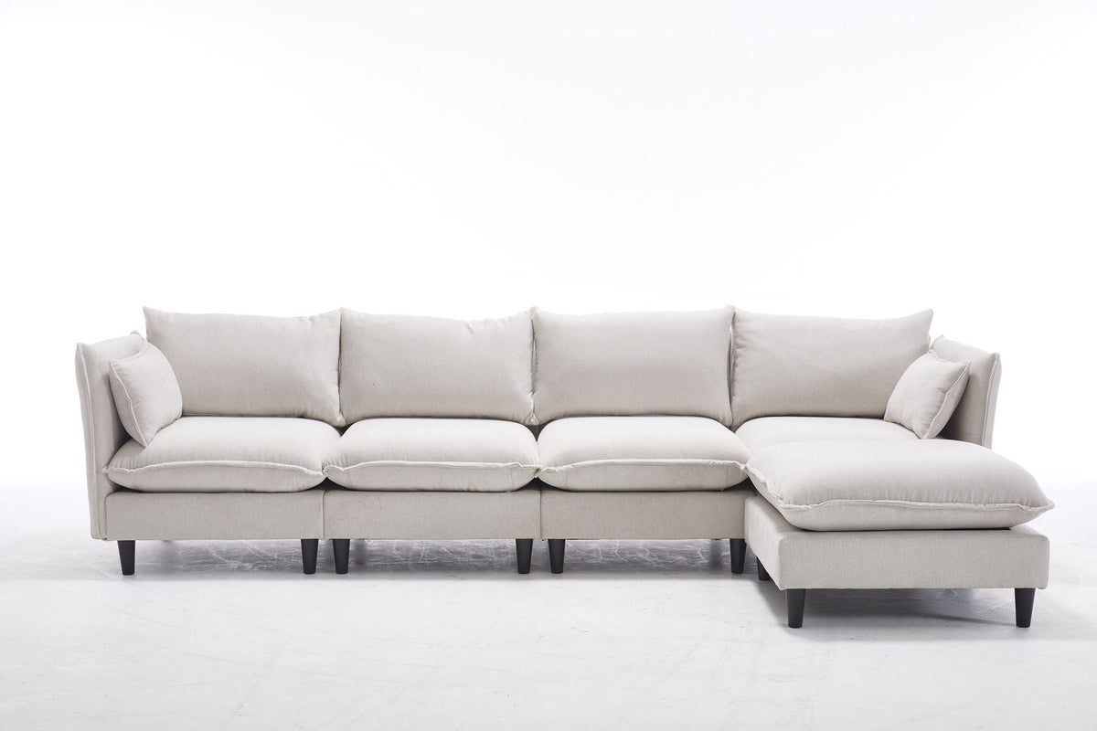 Beige sectional sofa with chaise ottoman and four seat cushions
